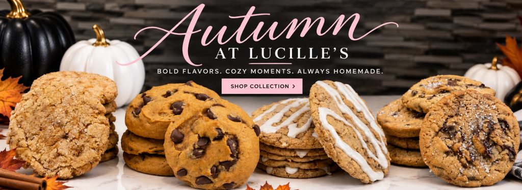 Autumn at Lucille's Baked Goods featuring four gourmet fall cookies: Apple Pie Spice, Pumpkin Chocolate Chip, Butter Crunch, and Salted Chocolate Caramel, displayed with seasonal pumpkins.